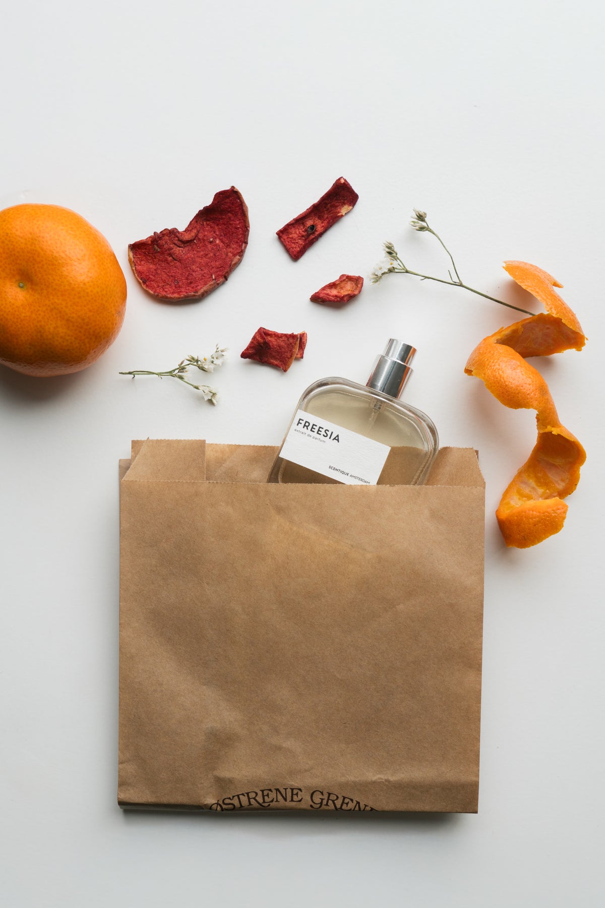 Freesia Scentique Amsterdam flatlay, 50ml